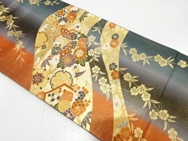 Bag belt with woven pattern of butterflies, chrysanthemums, and weeping cherry b